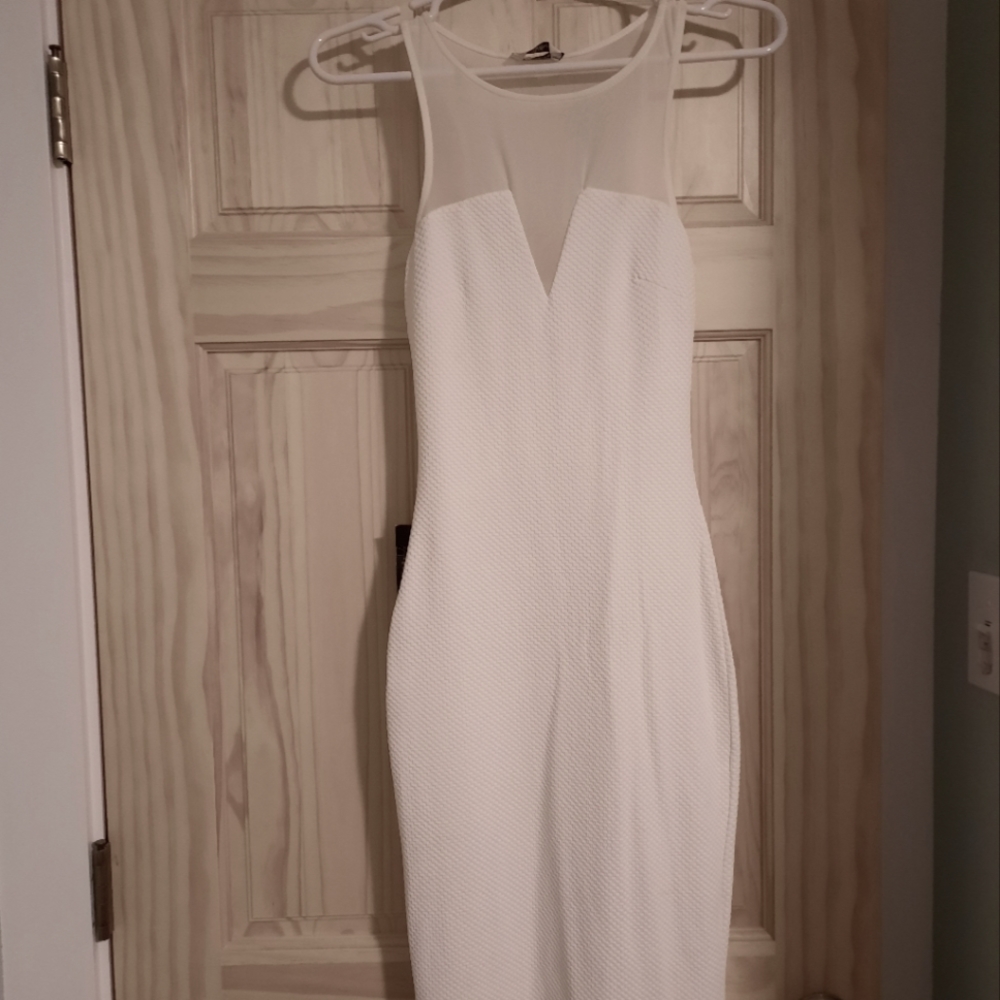 White mid length Bebe dress.